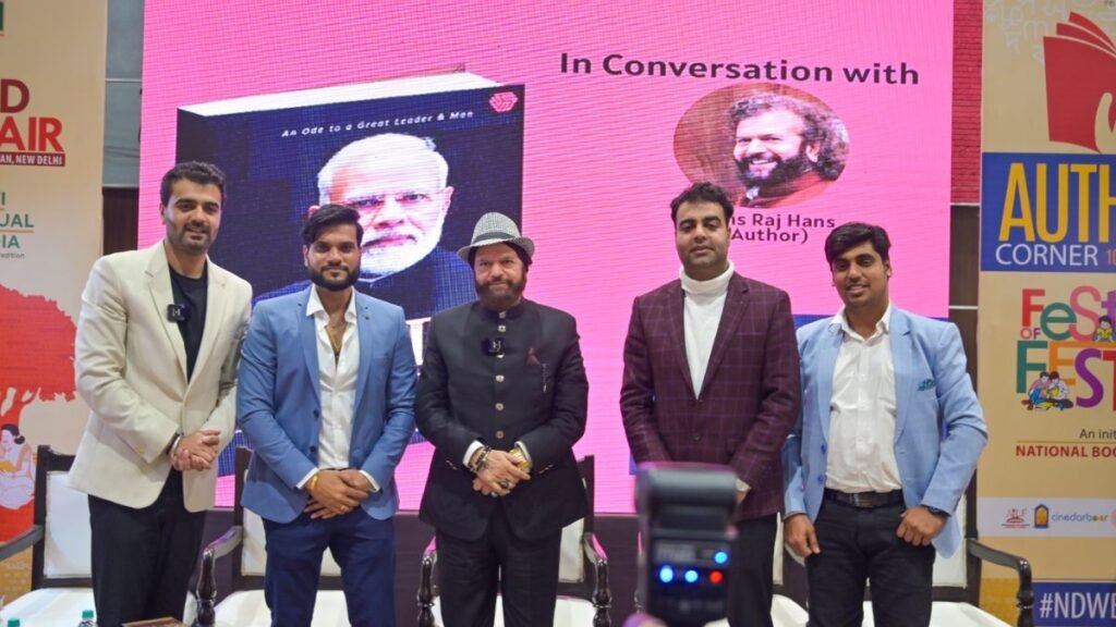 World Book Fair Unveils 'Modi: The Man, The Vision, The Transformation' by Hans Raj Hans, Published by Invincible Publishers - National - PNN Digital World Book Fair Unveils 'Modi: The Man, The Vision, The Transformation' by Hans Raj Hans, Published by Invincible Publishers - New Delhi (India), February 28: Prime Minister Narendra Modi, a transformative figure in Indian politics, is the subject of a comprehensive new book titled "Modi: The Man, The Vision, The Transformation," authored by the esteemed Hans Raj Hans, who is recognized for his versatility as both a singer and a politician. Renowned for his diverse talents, Hans Raj Hans launched the book on February 15, 2024, at the prestigious World Book Fair 2024. This insightful publication offers readers an intimate look into the life, vision, and transformative leadership of Prime Minister Modi. - PNN Digital
